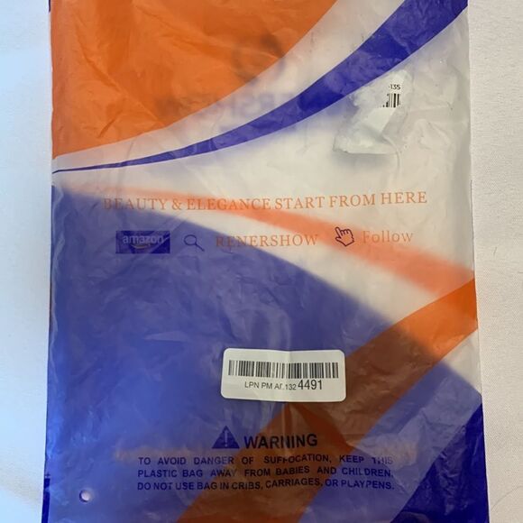 Brown wavy wig. Combs smoothly like hair.  Not sure if it's real/synthetic. - Picture 13 of 14